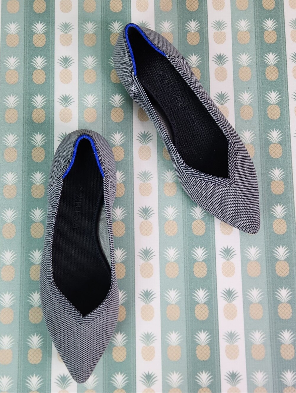 Rothy's Pointed Toe Flats in Black and White with Blue Trim